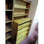 A Teak Bookcase, with seven shelves, 91.5cm wide, another smaller in oak.