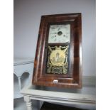 A XIX Century Ansonia New York Mahogany Cased Wall Clock; together with a similar mahogany cased