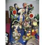 Six Reproduction Staffordshire Flatback Figures/Spill Vases, including golfers, The Rival, Napoleon,