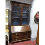 An XVIII Century Mahogany Bureau Bookcase, with stepped pediment, astragal glazed doors (two panes