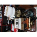 A Brass Table Lamp, small accordion (one key absent), model cannon, plane, dolphin group.