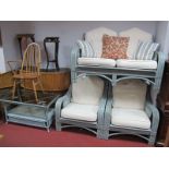 A Four Piece Cane Conservatory Suite, in brushed blue/grey, comprising two seater sofa, pair of
