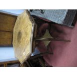 An Edwardian Inlaid Rosewood Window Table, with wavy octagonal top and undershelf, united by sabre