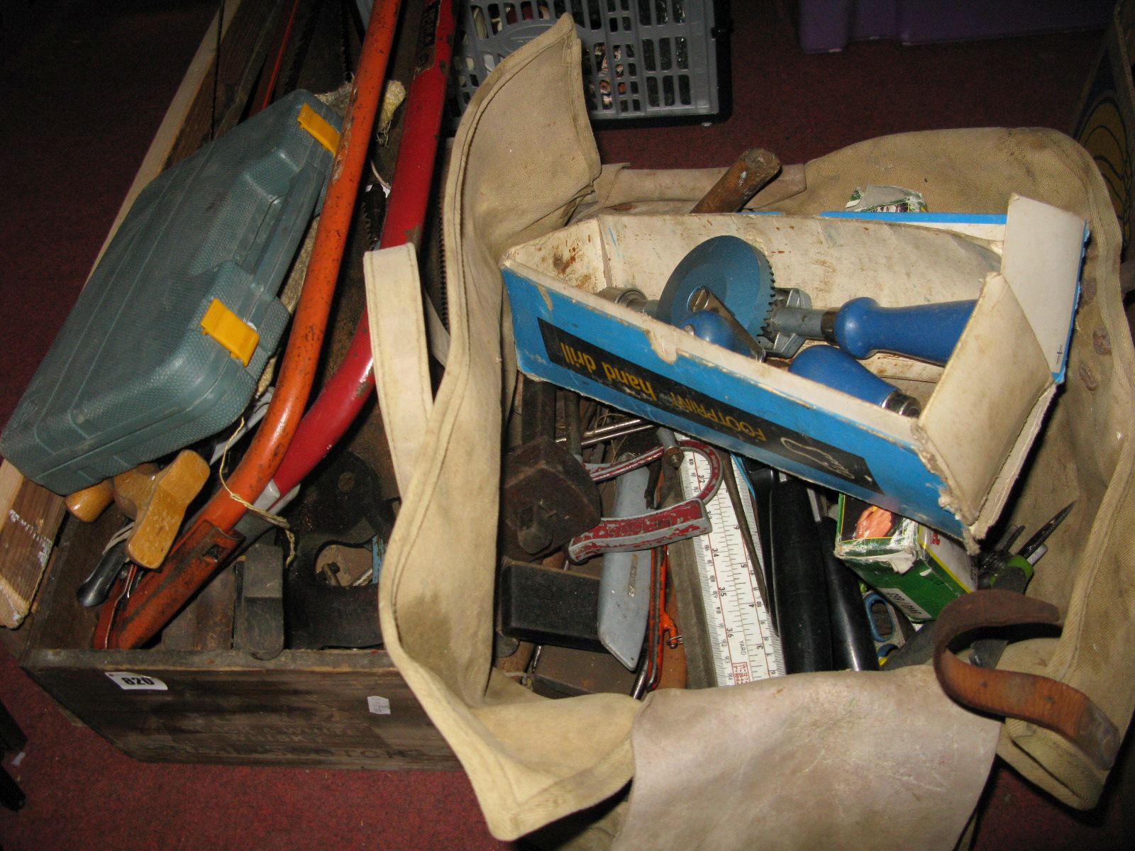 Saws, Footprint hand drill, other tools, in canvas bag and box.