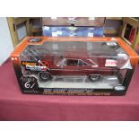 A Boxed ERTL 'Highway 61' 1:18th Scale 1967 Dodge Coronet R/T, burgundy.