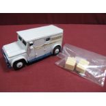 An Original Dinky #275 Brinks Armoured Car, off white/blue body, two figures, two crates, white