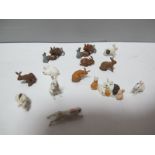 Ten Britains Plastic Rabbits and Three Britains Plastic Rabbit Families, very good.