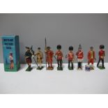 Nine Mid XX Century Britains Lead Figures, including Coronation Figures, Piper, Bandsmen, boxed