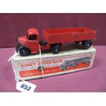 A Boxed Original Dinky #1521 Bedford Articulated Lorry, red body and trailer, black hubs, spare