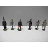 Six Britains Early XX Century Oval Based Lead Figures, including navy white jackets at the slope,