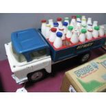 A Tri-ang Highway Large Steel Pressed Milk Wagon, with milk bottles. Playworn.