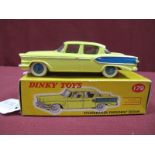 A Boxed Original Dinky #179 Studebaker President Sedan, yellow body, blue flash and hubs, black