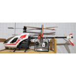A Kyosho Corporation Concept 30 RC Helicopter, white polypropylene with red detailing, "30030 blends