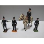 Three Mid XX Century Britains Lead Policeman, in different poses, pus a lead Timpo mounted