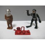 A Mid XX Century Taylor and Barrett Lead Deep Sea Diver; together with another lead diver figure.
