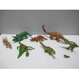 Seven Plastic Dinosaurs by Cherilea and Timpo, playworn, some damage noted.