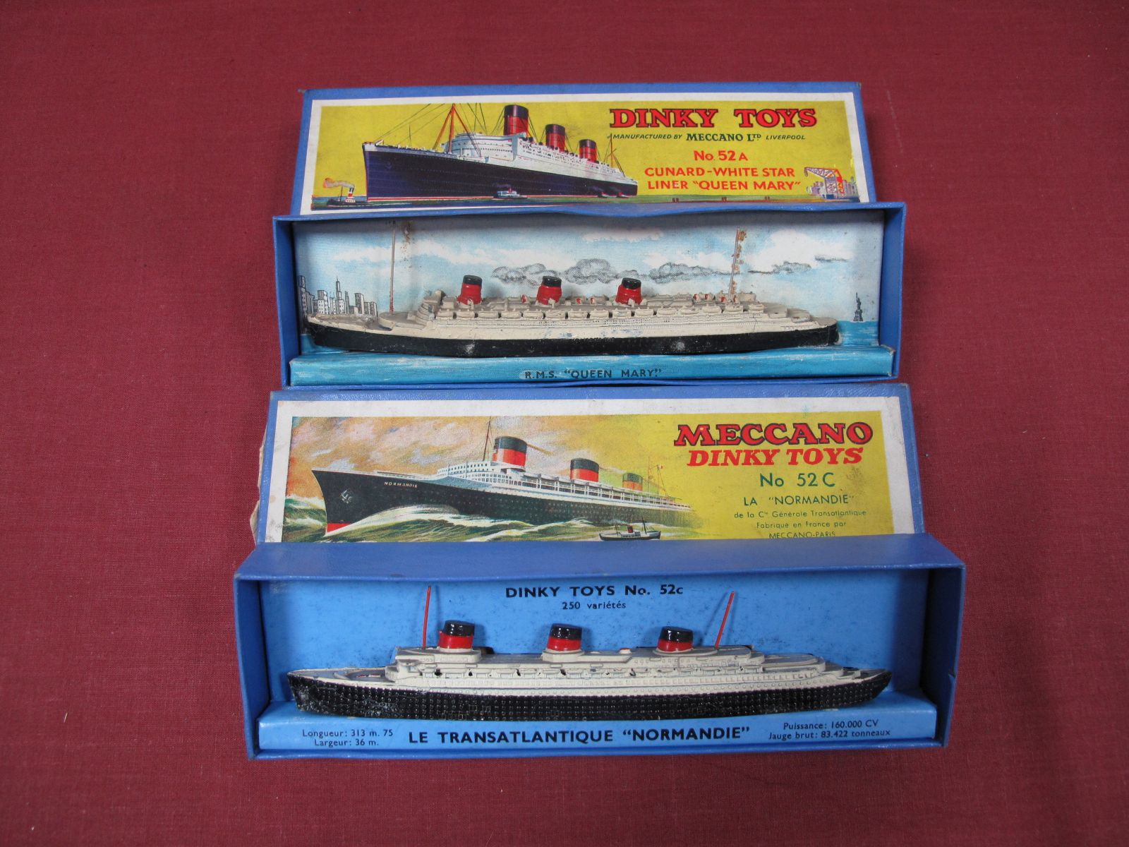 Two Pre-War Dinky Ships, No. 52A Cunard White Star- 'Queen Mary' and 52C 'La Normandie', both