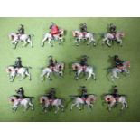 A Pre-First World War Mounted Band of The Life Guards, twelve figures finished in blue and gold on