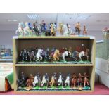 A Quantity of Twenty Eight Plastic Mounted Figures by Timpo, Britains and Deetail, among others.
