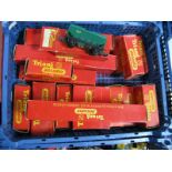 A Quantity of 'OO' Gauge Model Railway Four Wheel Wagons and Coaches by Tri-ang, all playworn and
