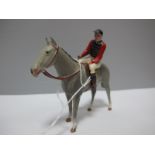 A Mid XX Century Britains Lead "Racing Colour" Horse and Jockey "The Queens Colour", overall good,