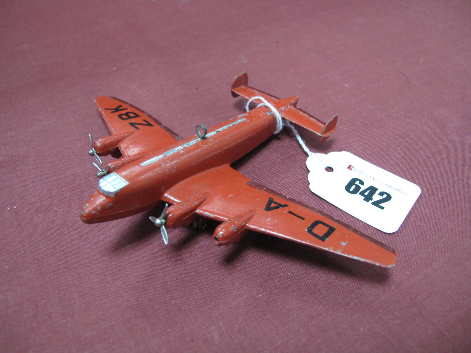 A Pre-War Dinky Aircraft No. 62y High Speed Monoplane, D-A ZBK, finished in red/maroon, missing