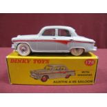 A Boxed Original Dinky #176 Austin A105 Saloon, grey body, red panel line, spun hubs. Model very