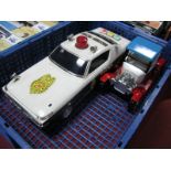 A Plastic Battery Operated Japanese Police Car, Highway Patrol, white/black, three push buttons on