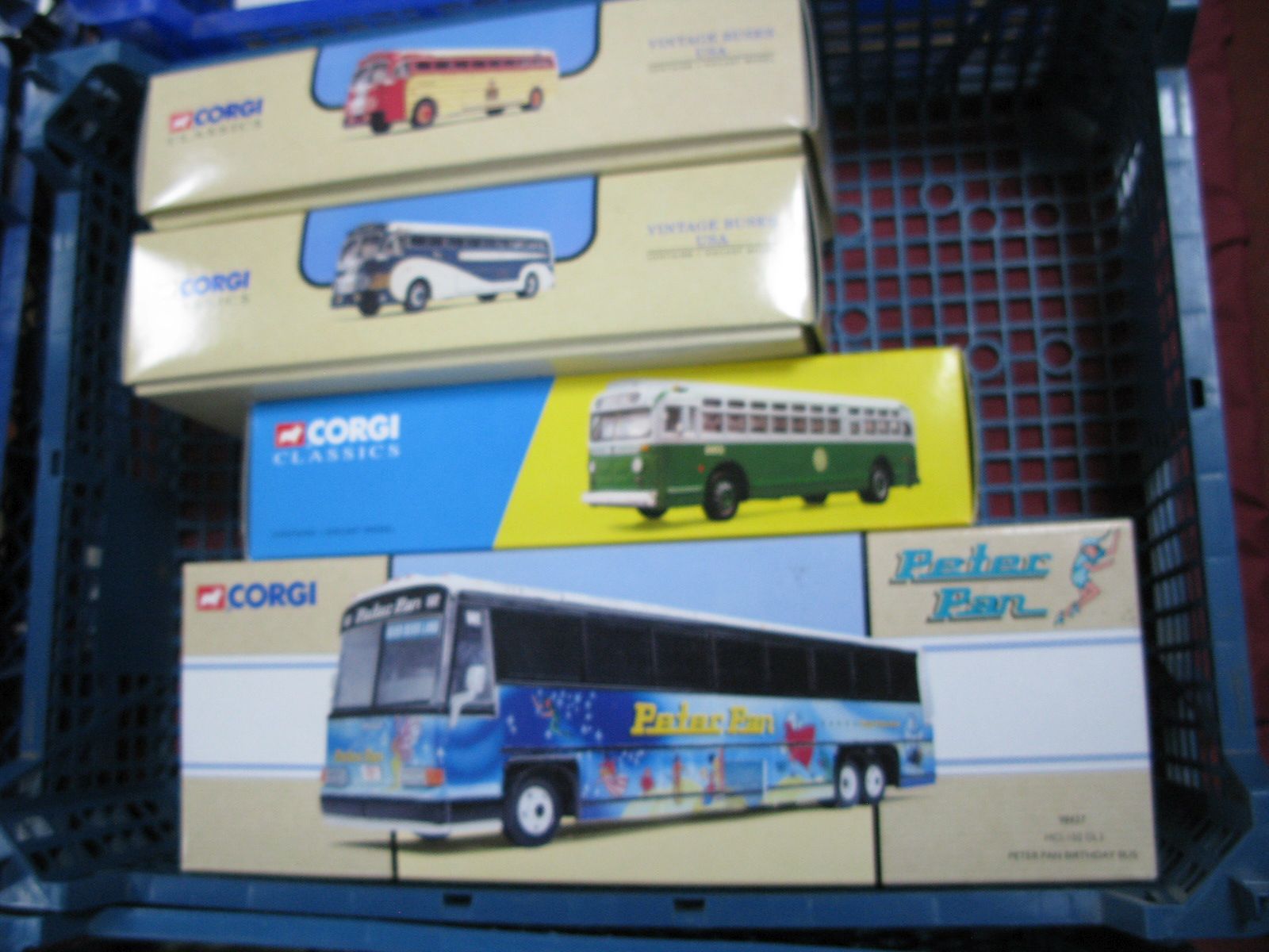 Four Boxed Corgi American outline Diecast Buses, #98427 Peter Pan birthday bus (in original shrink