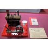 A Mamod Live Steam SE2 Model Steam Engine, red base, model has been steamed, no burner, literature