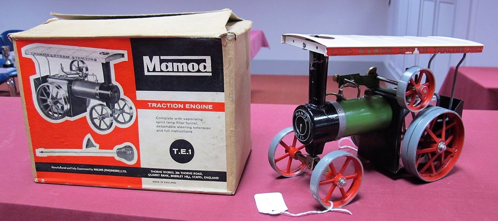 A Mamod Live Steam TE1 Model Traction Engine, green/black bodywork, burner and scuttle present,