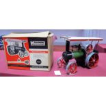 A Mamod Live Steam TE1 Model Traction Engine, green/black bodywork, burner and scuttle present,