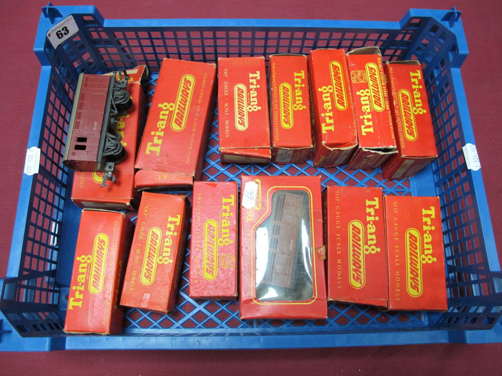 Thirteen Triang "OO" Gauge Rolling Stock Wagons and Vans, including HR15 Milk Wagon, #R215 Buck