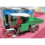 A Mamod Live Steam Model SW1 Steam Wagon, burner present, missing shuttle, filler funnel, steering