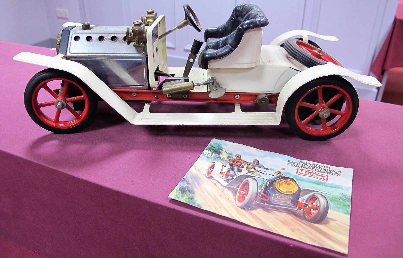 A Mamod Live Steam SA1 Model Roadster, six spoke wheel model, cream body, model has been steamed, no