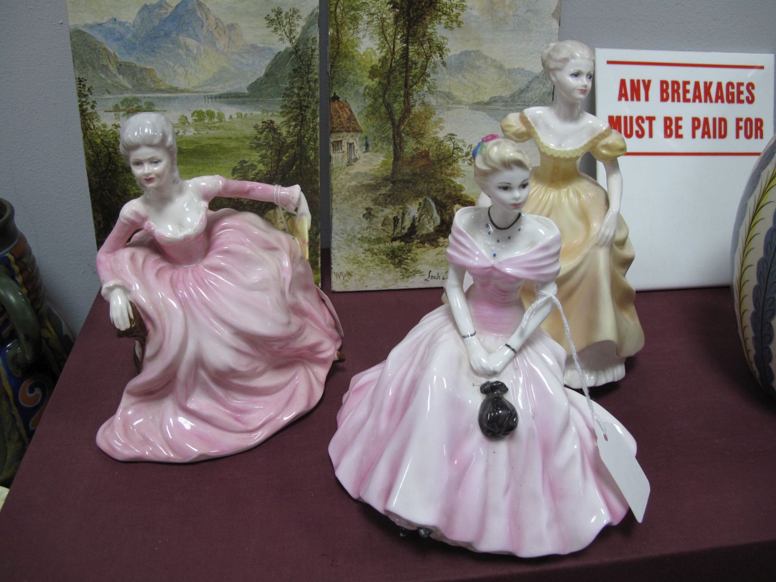 Three Coalport China Figurines, including 'Emily' (2nd quality) and 'Polly'.