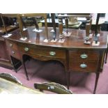 A Late XVIII Century Bow Fronted Sideboard, the crossbanded top with boxwood stringing, central