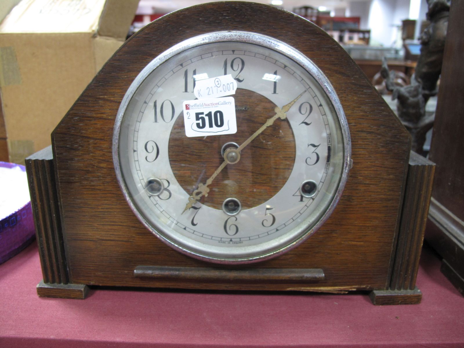 An Early XX Century Mahogany Cased Mantel Clock, with black Roman numerals to white enamel dial,