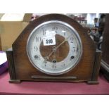 An Early XX Century Mahogany Cased Mantel Clock, with black Roman numerals to white enamel dial,