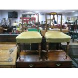 An Edwardian Pair of Salon Chairs, shaped top rail, with batwing inlay, upholstered seats, on turned