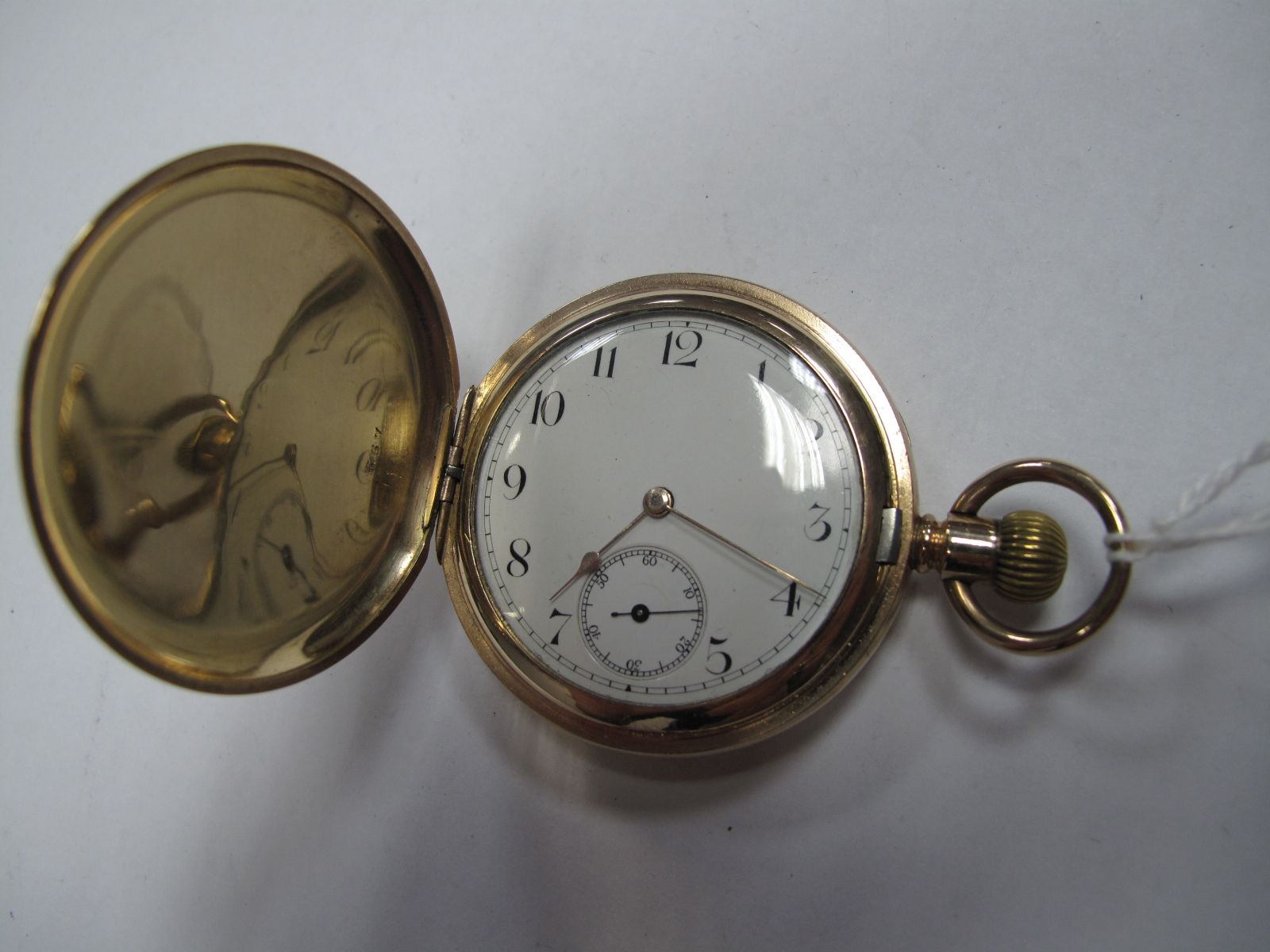 A Gold Plated Cased Hunter Pocketwatch, the dial with black Arabic numerals and seconds subsidiary