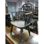A XIX Century Childs Ash and Elm Windsor Chair, with alterations and damage.