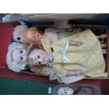 A Pot Headed Girl Doll, fixed open eyes painted moulded features, a further pot headed girl doll,