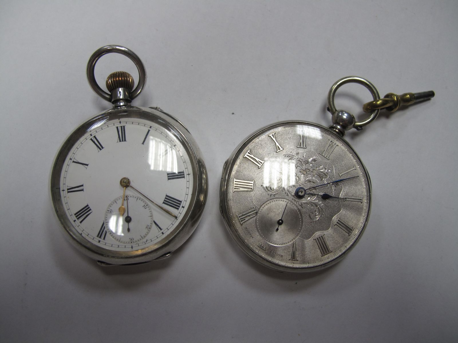 A Decorative Continental Cased Openface Pocketwatch, the leaf scroll engraved dial with Roman