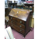 A XIX Century Mahogany Bureau, with fall front over three drawers.