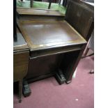 A XIX Century Mahogany Davenport Desk, with upper stationery compartment, lift up top, four side