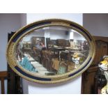An Oval Bevelled Wall Mirror, in gilt frame.