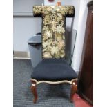A XIX Century Prie Dieu Chair, with a 'T' shaped upholstered back and seat, on rosewood cabriole