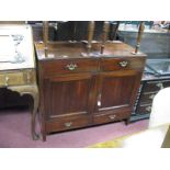 A XIX Century Mahogany Cupboard, with two upper and two lower drawers, twin doors and splayed feet.