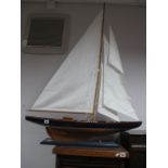 A Four Sail Yacht, on stand.